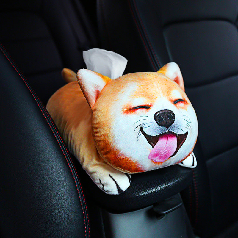 Plush dog-shaped tissue holder on a car seat