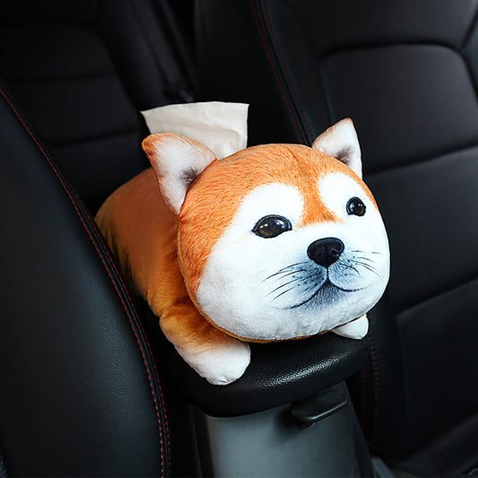 Plush dog-shaped car organizer with tissues on a car seat